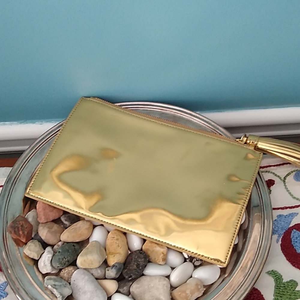 Loeffler Randell, leather gold clutch.